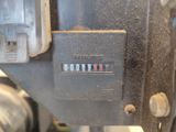 a close up picture of a meter on a machine