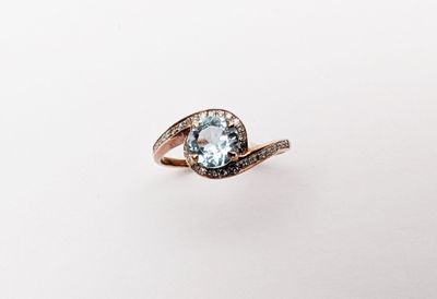 BAGUE en or rose 375‰ ornée d'une aigue-marine de taille ron…