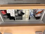 a display case with various items in it in a store