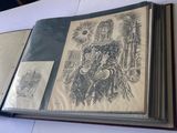 a book with a drawing of a woman sitting on a horse