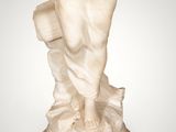 an image of a statue of a woman holding a book