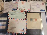 many different types of envelopes on the table