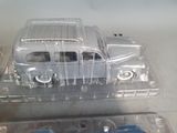 a plastic box with a toy car inside of it