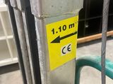 a close up of a forklift with a sign on it
