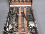 a silver case with a set of silverware in it