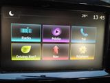a picture of a car ' s dashboard with various buttons