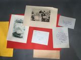 many pictures of people on a table with a lot of papers