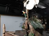 a fake pirate ship on display in a museum