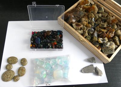 a box of rocks and stones sitting on a table