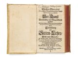 an old book with a black and white title on it