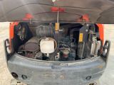 a small engine in the back of a car