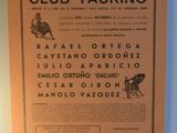 a sign on the wall that says club tauinio