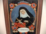an image of a painting of a nun holding a cross in a frame