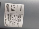 a label on the back of a machine that is not working