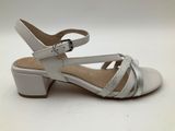 a close up of a pair of women ' s shoes on a white surface