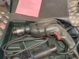 a box with tools in it sitting on a table