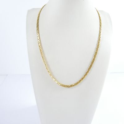 a gold chain necklace on a mannequin mannequin mannequin mannequin mannequin mannequin mannequin mannequin manne