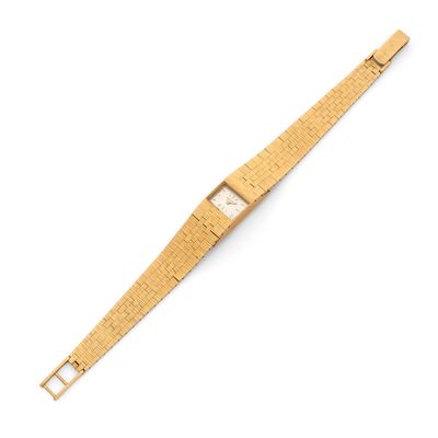 an image of a gold wrist watch with a square face