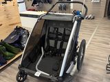 a baby stroller in the middle of a store