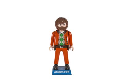 un gros plan sur une figurine représentant un homme barbu