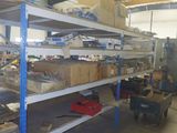 many boxes on the shelves in the warehouse