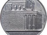 an image of a coin with a statue on top of it