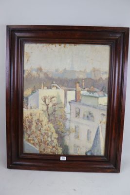 tableau encadré représentant une vue de ville avec des bâtiments et des arbres