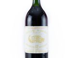a bottle of wine that is sitting on a table