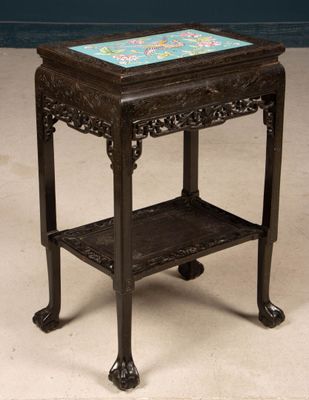 Table à ouvrage en bois noirci sculpté , plateau orné d'une …