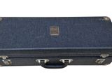 a blue suitcase that is sitting on a white surface