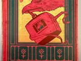 an old book with a picture of a bird on top of a toaster