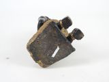 a small piece of rock that is sitting on top of a white surface