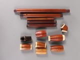 a lot of wooden pipes that are on the table