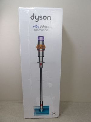the box of the dysonon vacuum is open on the table