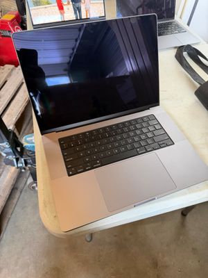a laptop that is sitting on a table in a room