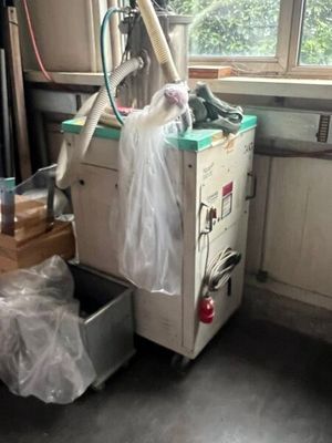 a machine that is sitting in the corner of a room