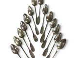 a lot of spoons and spoon spoons on a white surface