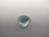an image of a faceted blue topaz gemstone