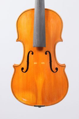 an old violin with a bow on a white background