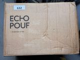 a box of echo pouf sitting on the floor