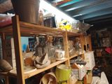 a shelf full of various items in a room