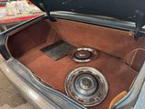 two speakers in the trunk of a car