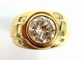 an image of a gold ring with a diamond in the center