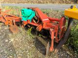 a tractor that has been pulled over by a plow