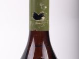 a bottle of wine that is sitting on a table