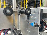 an image of a machine that is working on a piece of machinery