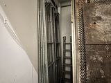 an image of a room that has a bunch of wires on the wall