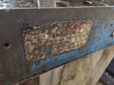a close up of a metal box with a sign on it