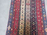 an old rug is laying on the floor in a room