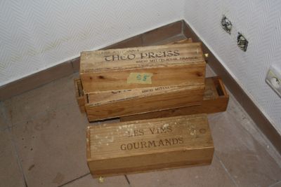 two wooden boxes that are sitting on the floor